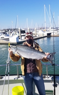 angler with Chinook salmon